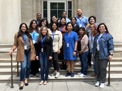 The newly selected cohort of 16 fellows for the YCA Program stand in front of the entrance to the Yale School of Medicine